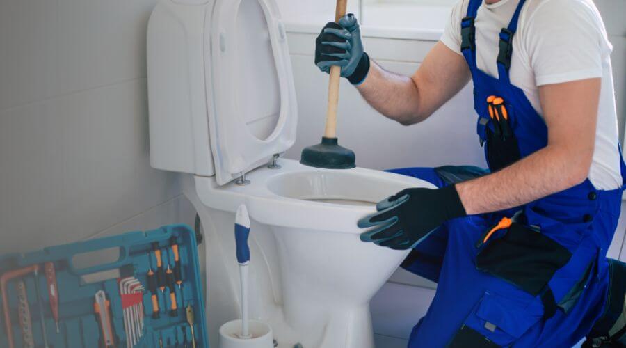 Professional clogged toilet repair in Camden, MO